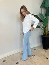 FLARE JEANS WITH HEM DETAIL LIGHT DENIM