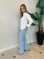 FLARE JEANS WITH HEM DETAIL LIGHT DENIM