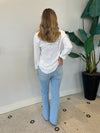 FLARE JEANS WITH HEM DETAIL LIGHT DENIM