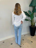 FLARE JEANS WITH HEM DETAIL LIGHT DENIM