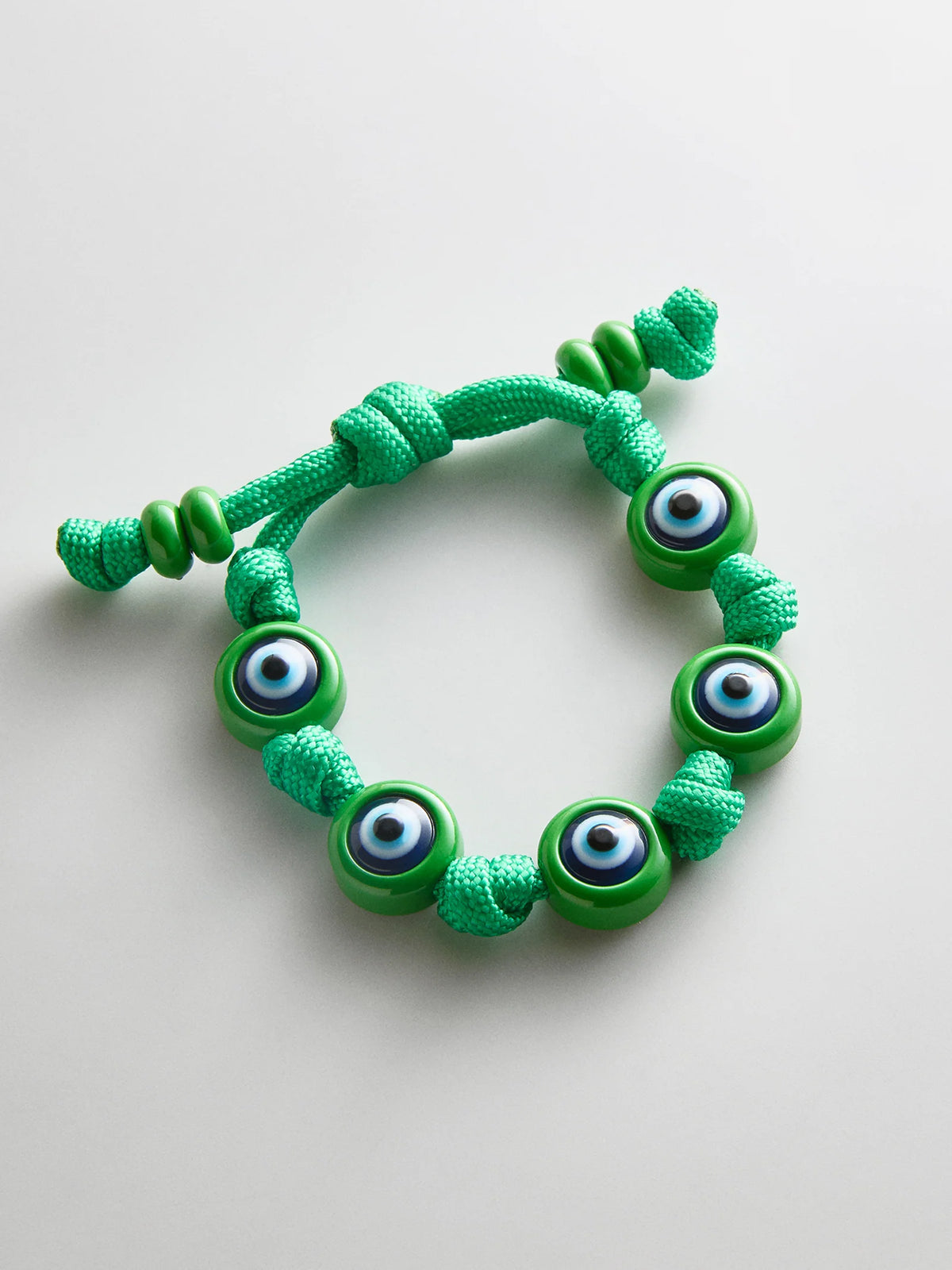 KNOTTY GOOD EYE CORD BRACELET  BRIGHT GREEN