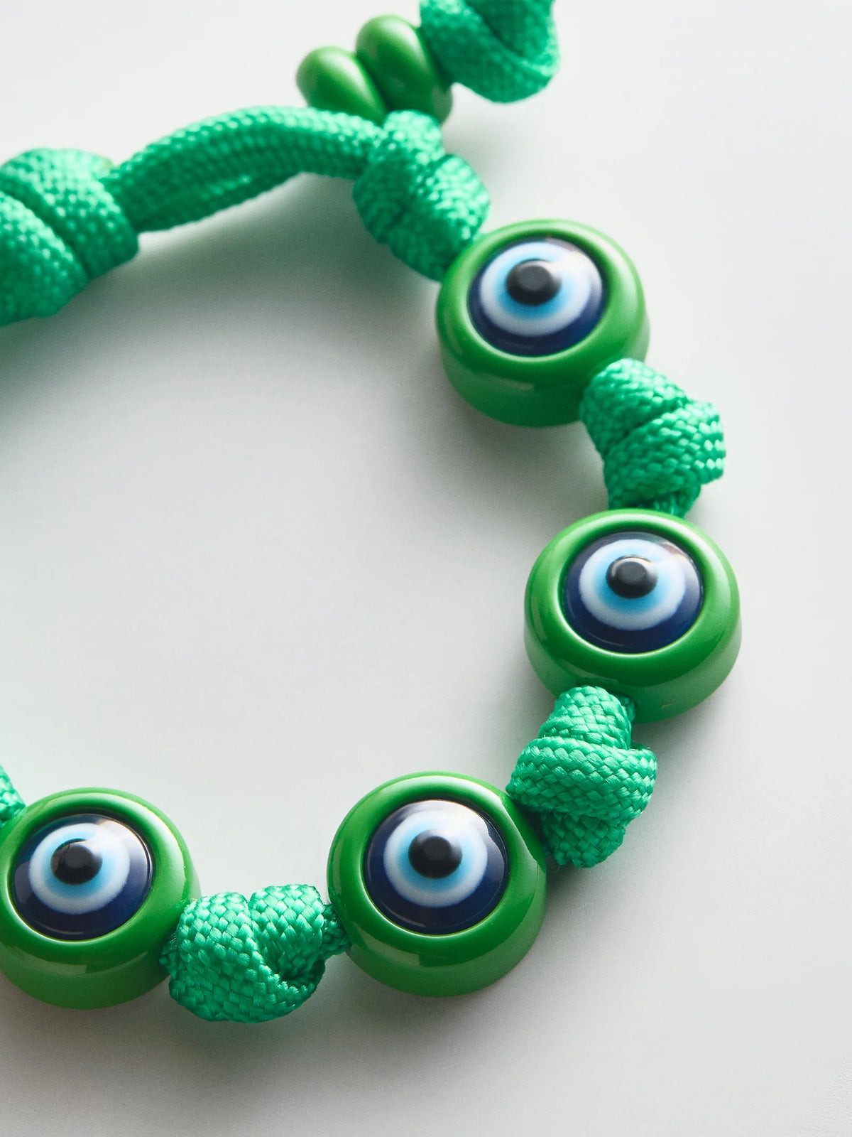 KNOTTY GOOD EYE CORD BRACELET  BRIGHT GREEN