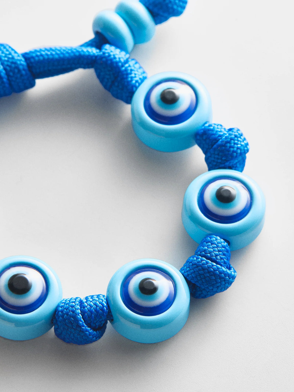 KNOTTY GOOD EYE CORD BRACELET  AQUA